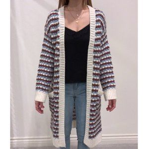 Long multicolored knitted cardigan with pockets.